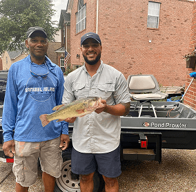 Joe and Jerry with their boat and Sidekick products